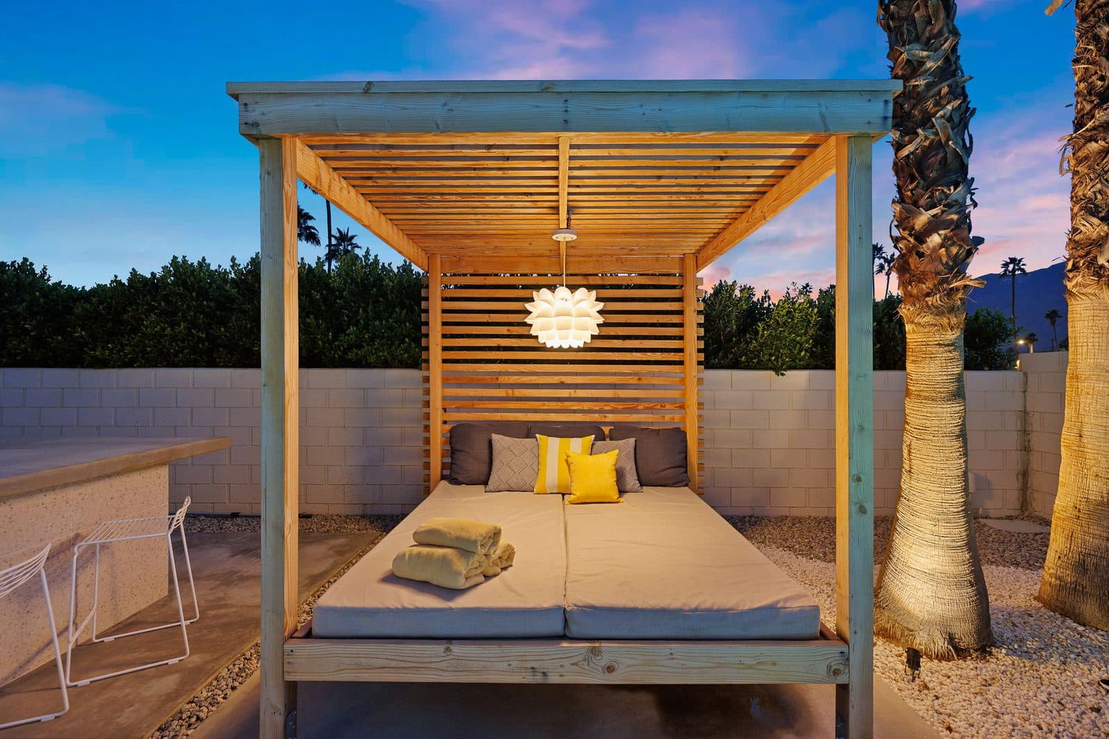 Cabana daybed beneath the palms