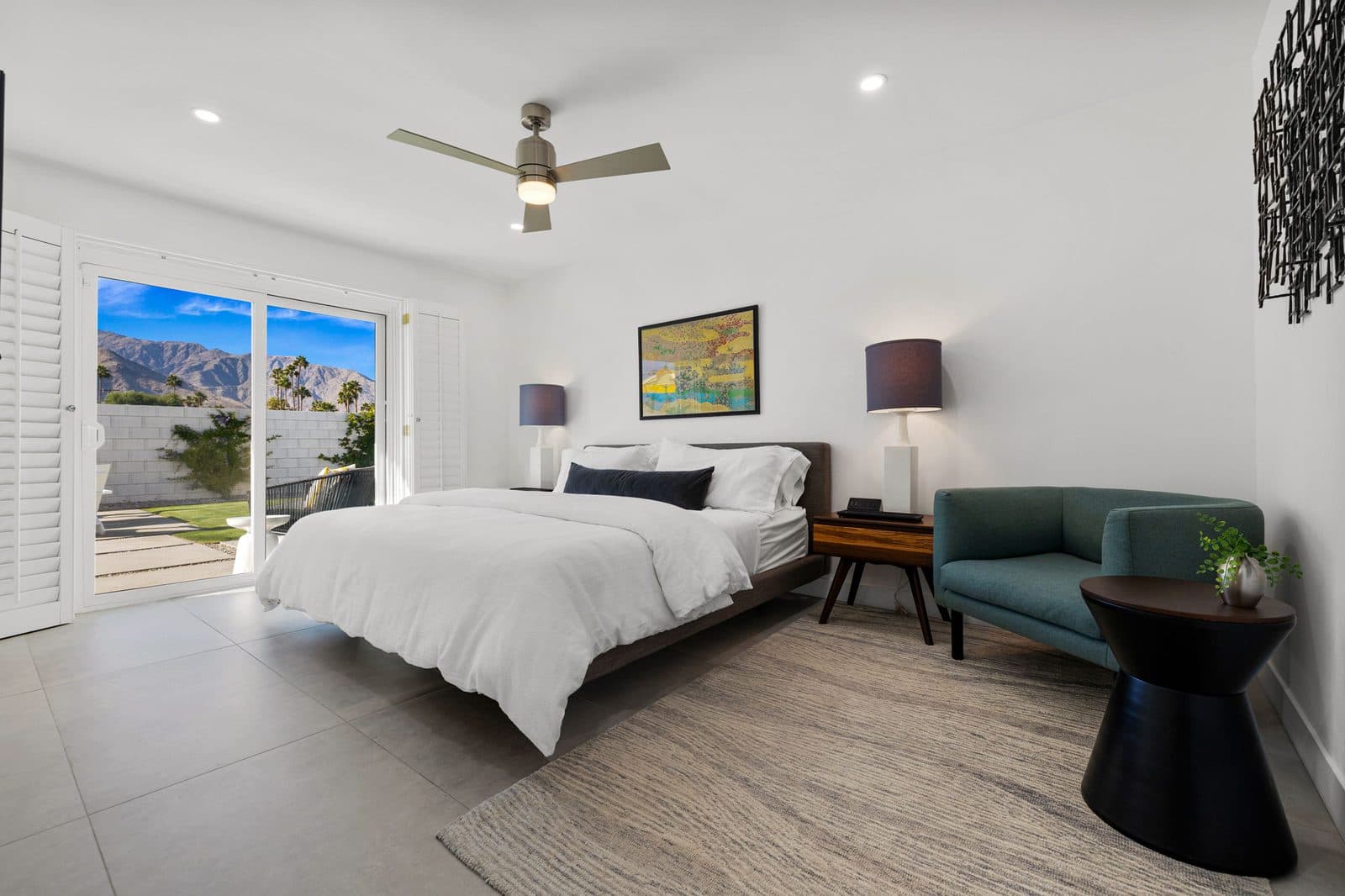 Bedroom with green lounge chair