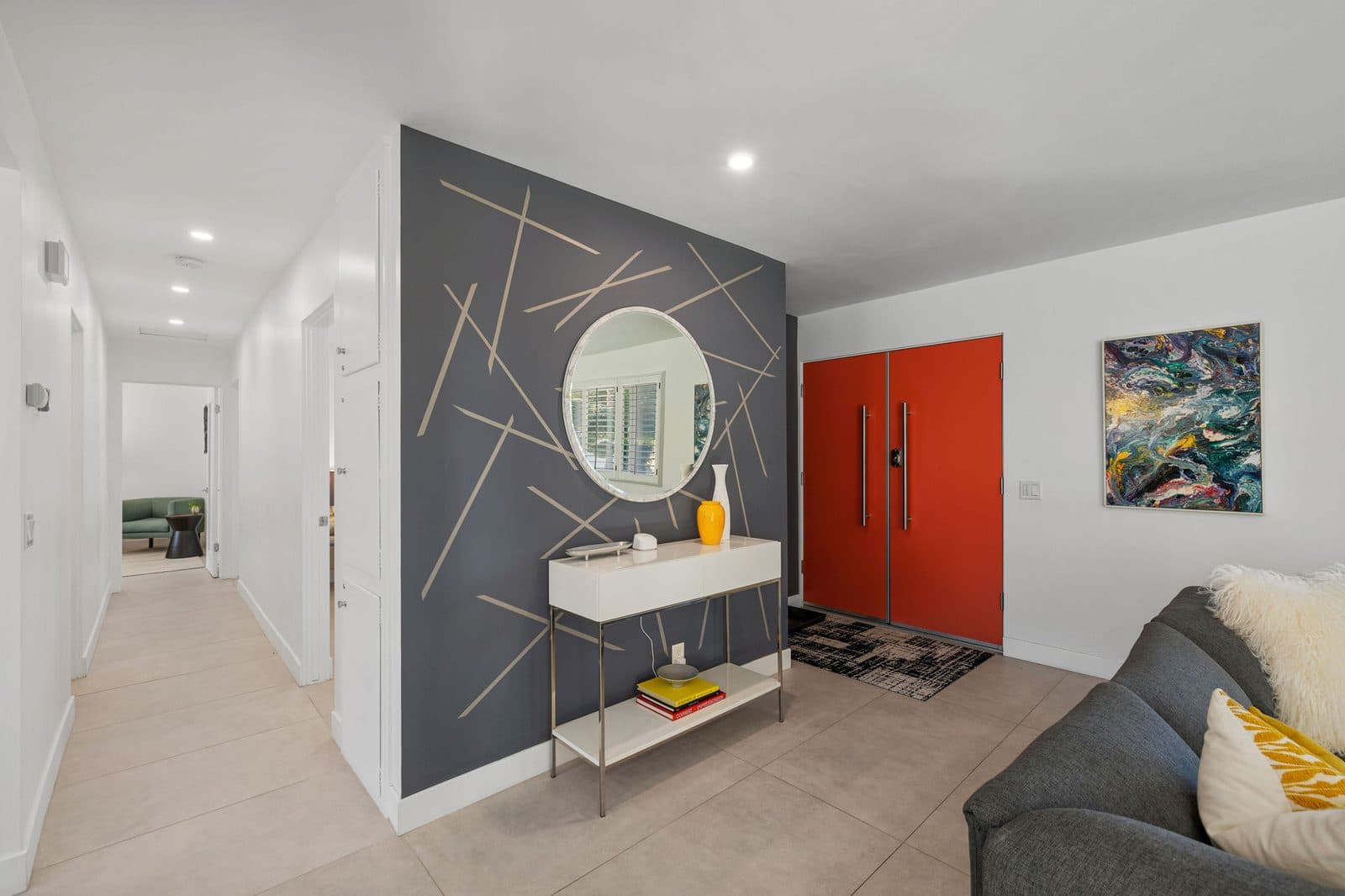 Entry hall with round mirror and console