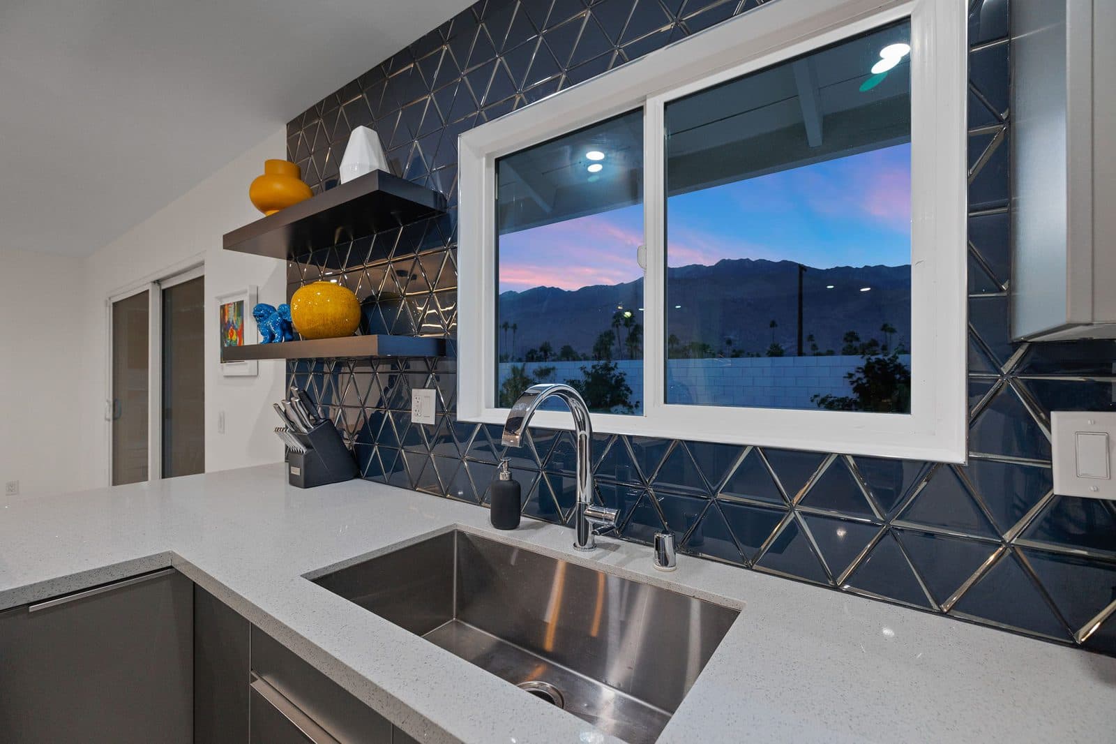 Kitchen sink with mountain view window